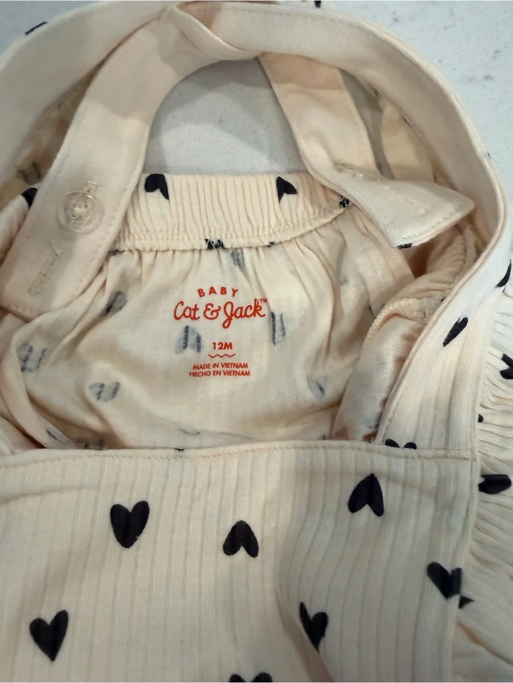 Cat & Jack Cream Romper with Black Hearts (12-months)